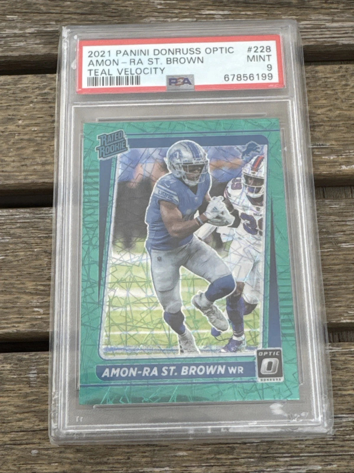 2021 Donruss Optic Amon-Ra St Brown RC Rated Rookie Green Velocity #288 PSA 9